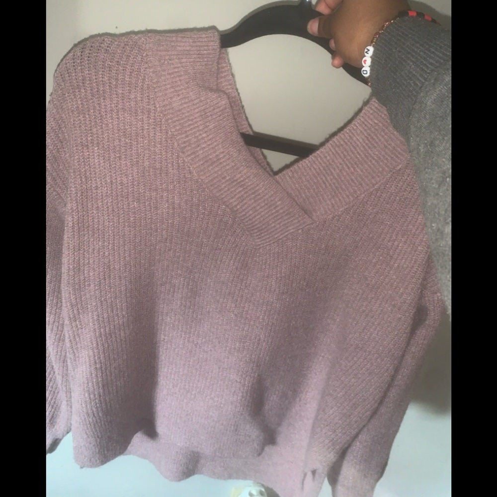 Purple sweater , it’s very soft, and hasn’t been worn. Still had the tags on it